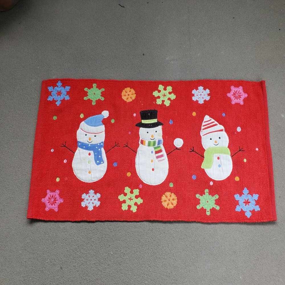 Festive Red Indoor Christmas Rug With Snowman Design And Colorful Snowflakes